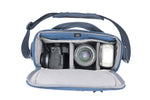 Macchina fotografica e obiettivo in borsa blu Vanguard Veo Range 21M NV